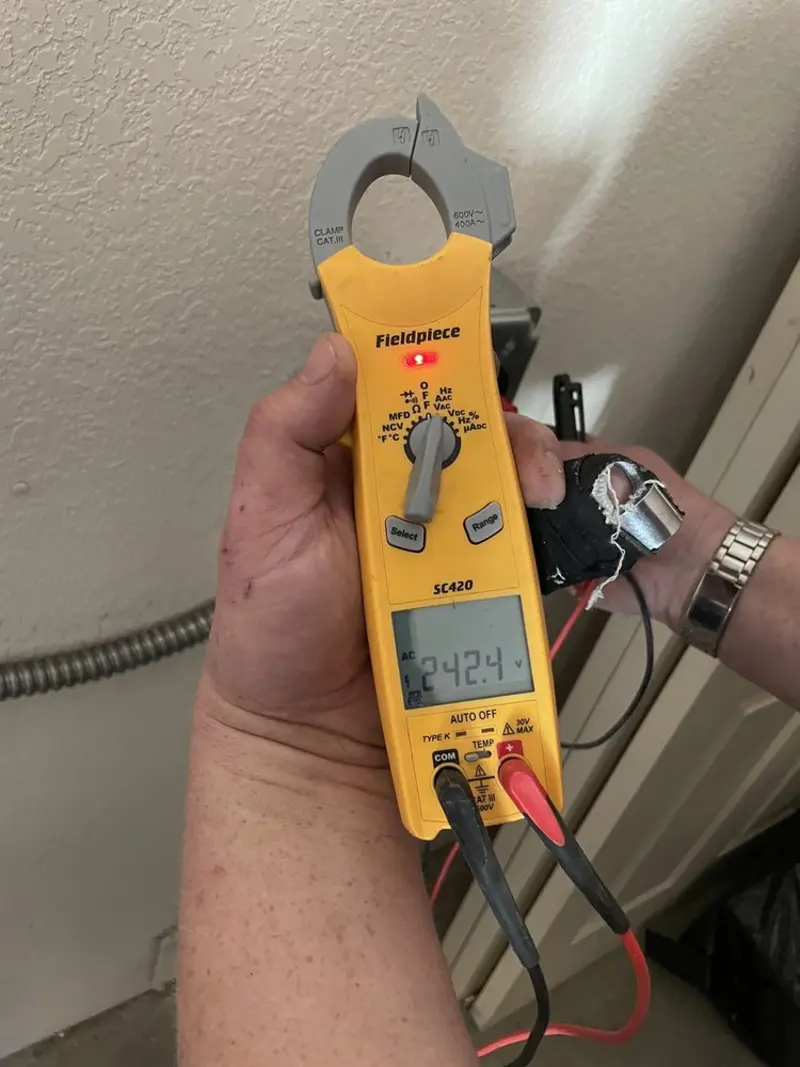 Voltage testing with clamp meter during Aluminum Wiring Replacement in Bargersville